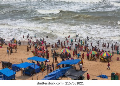 Aerial View Of Holiday Season Crowd At Sea Beach With Stalls And Beach Umbrellas At Puri, Odisha, India Dated 13th May 2022