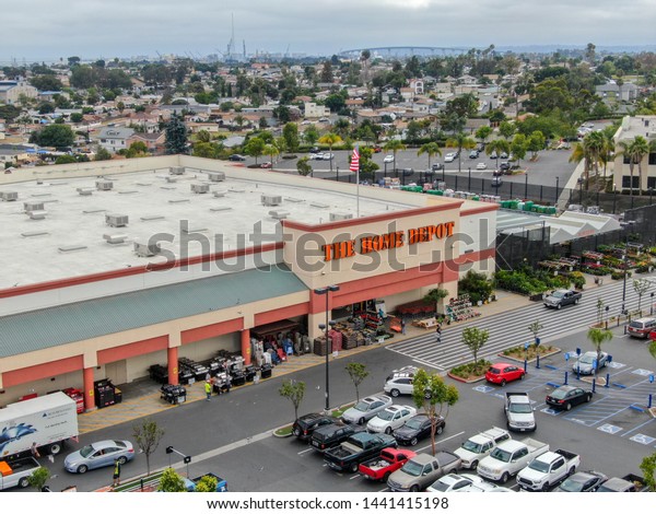 Aerial view of The Home Depot store and\
parking lot in San Diego, California, USA. Home Depot is the\
largest home improvement retailer and construction service in the\
US. 06/22/2019