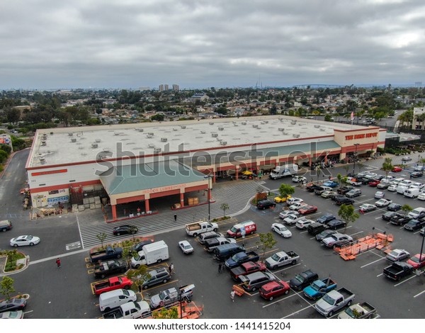 Aerial view of The Home Depot store and\
parking lot in San Diego, California, USA. Home Depot is the\
largest home improvement retailer and construction service in the\
US. 06/22/2019