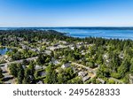 An aerial view of homes and the Puget Sound in Burien, Washington.