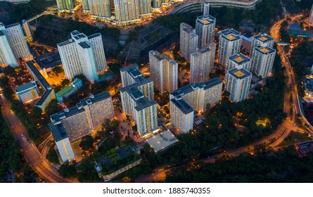 Aerial View Of Hong Kong Residential Housing At Sunset .