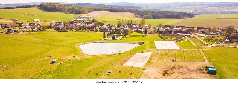 Aerial View Of Horse Farm With Pond In Spring. Countryside Landscape In Milinov, West Bohemia, European Union.