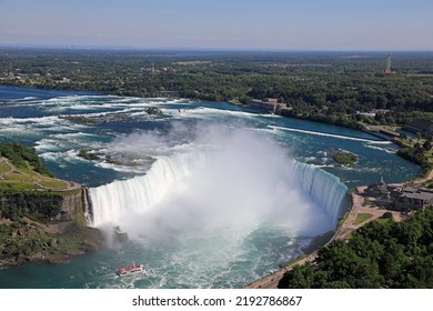 Aerial View Of Horseshoe Falls Including Hornblower Boat Sailing On Niagara River, Canada And USA Natural Border