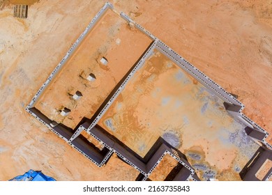 Aerial View Of House Foundation Made From Concrete Shuttering Blocks