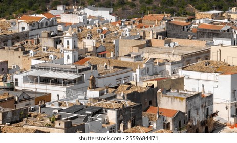 Aerial view of houses, apartments and buildings located in the historic center of the town of Bernalda, in the province of Matera, Basilicata, Italy. It is a traditional Italian village. - Powered by Shutterstock