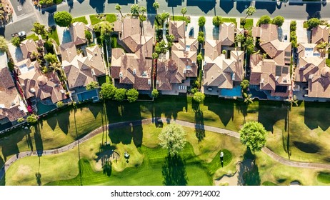 Aerial View of Houses on Golf Course - Powered by Shutterstock
