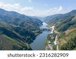 Aerial view of a hydro power plant, A dam across Nam Ou River in the northern of Laos, Flow to Mekong river pass though Phongsaly and Luangprabang province.    