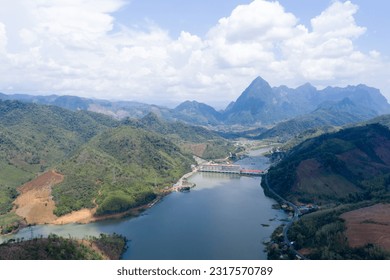 Aerial view of a hydro power plant, A dam across Nam Ou River in the northern of Laos, Flow to Mekong river pass though Phongsaly and Luangprabang province.    