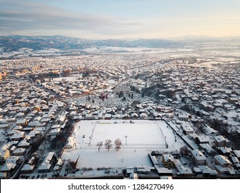 Aerial View Of An Ice Skating Rink An Rooftops