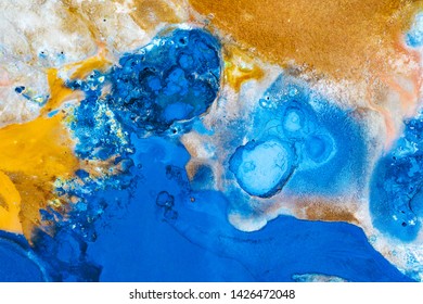 Aerial view of icelandic vulcanic sulfur subsoil. Geothermal coloured abstract background - Shutterstock ID 1426472048