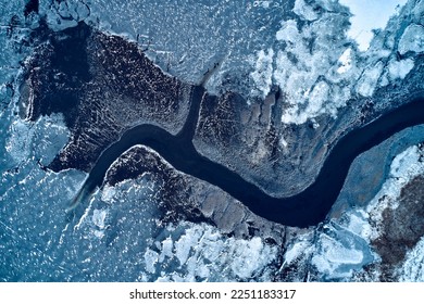 aerial view from icy river in winter