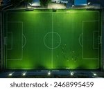 Aerial View of an Illuminated Soccer Field at Night