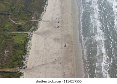 Aerial View, Image Of A Broad Beach With The Sea And Surf. Wooden Boardwalk Leads To The Beach. Galveston Island, Gulf Of Mexico, Texas, USA
