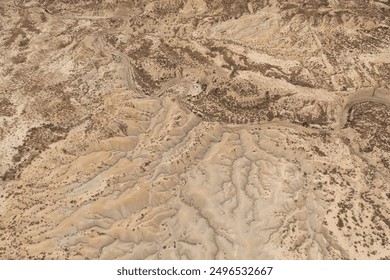 Aerial view of the incredible shapes of the arid lands of the Abanilla desert or Mahoya desert in Murcia, Spain - Powered by Shutterstock