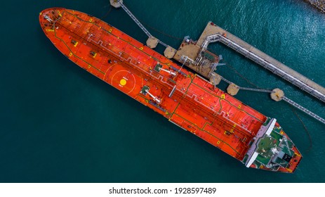 Aerial view industrial crude oil and fuel tanker ship at deep ocean sea port, Tanker ship vessel at terminal port, Business import export oil and gas petrochemical by tanker ship transportation oil.