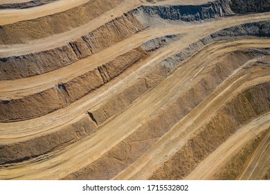 Aerial View Of Industrial Terraces On Mineral Mine. Opencast Mining. Drone View From Above.