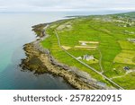 Aerial view of Inishmore or Inis Mor, the largest of the Aran Islands in Galway Bay, Ireland. Famous for its strong Irish culture, loyalty to the Irish language, and a wealth of ancient sites.