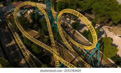Aerial view of the iron structures of a roller coaster.