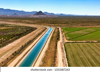 Aerial view of irrigation canal and agriculture above the Avra Valley in Marana, Arizona