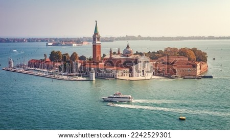 Aerial view of the island and the church of San Giorgio Maggiore from the bell tower (from the Campanile di San Marco), in the background the island of the Lido islands. Venice, Italy