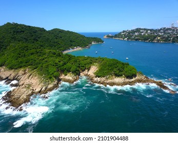 Aerial view of the island of la roqueta from the north side and bay of Acapulco, Mexico