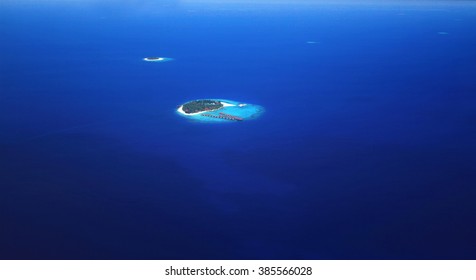 Aerial View Of Island In Ocean