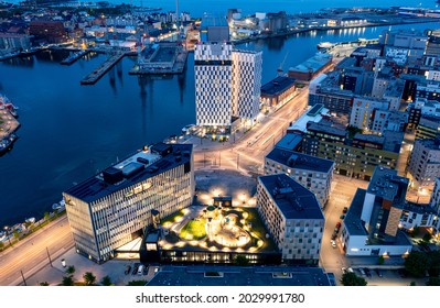 Aerial View Of The Jatkasaari Neighborhood Is A Brand New District In Helsinki. The Modern Buildings Of Hotels, Offices, And Residential Buildings. The Night Cityscape.