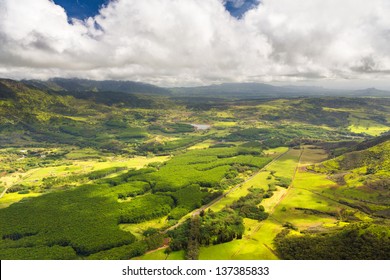 Aerial View Of Kauai Overlooking A Green Valley