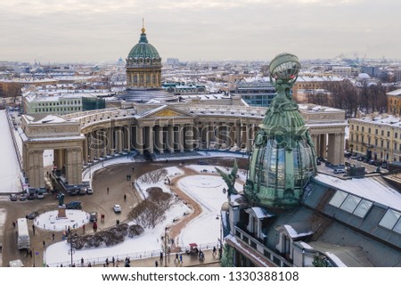 Aerial view of Kazan Cathedral in clear winter day, a copper dome, gold cross, colomns, Nevsky prospect, Zinger's Building, Griboyedov Canal, staff apartments vk.com, vkontakte