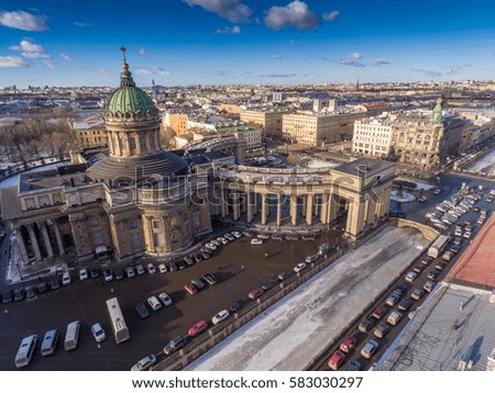 Aerial view of Kazan Cathedral in clear winter day, a copper dome, gold cross, colomns, Nevsky prospect, Zinger's Building,  city panorama, Griboyedov Canal, staff apartments vk.com, vkontakte