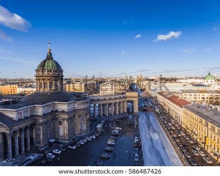 Aerial view of Kazan Cathedral in clear winter day, a copper dome, gold cross, colomns, Nevsky prospect, Zinger's Building, Griboyedov Canal, staff apartments vk.com, vkontakte, Herzen's university