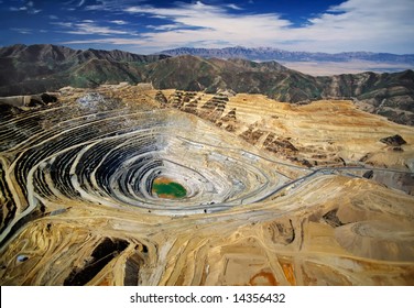 Aerial view of Kennecott's Bingham Canyon Mine - an open-pit copper mine - largest man-made excavation on earth - Powered by Shutterstock