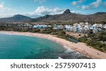 Aerial view of Kenting Baishawan beach in Taiwan featuring blue waters and scenic mountains