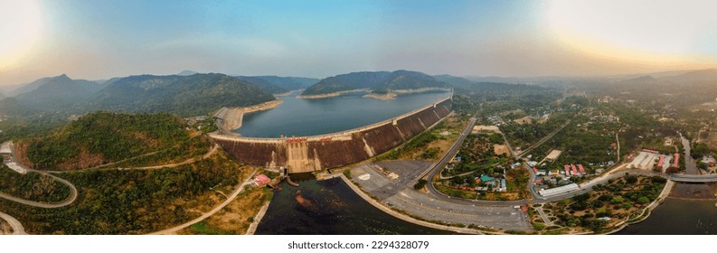 Aerial view of Khun Dan Prakan Chon This is the largest roller compacted concrete (RCC) dam in the world.concrete dam in the world during sunset in Nakonnarok Thailand.Landscape for banners and web