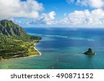 Aerial view of Kualoa Point and Chinamans Hat at Kaneohe Bay, Oahu, Hawaii, USA