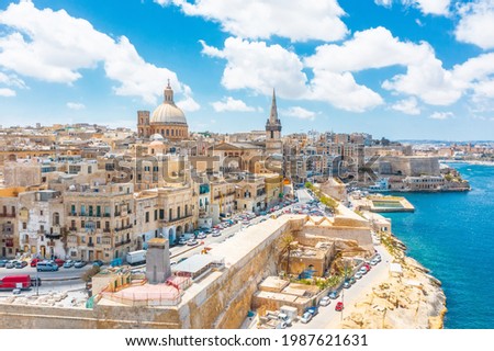 Aerial view of Lady of Mount Carmel church, St.Paul's Cathedral in Valletta embankment city center, Malta