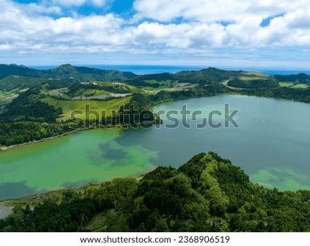 Aerial view of Lagoa das Furnas located on the Azorean island of Sao Miguel, Azores, Portugal. Lake Furnas (Lagoa das Furnas) on Sao Miguel, Azores, Portugal from the Pico do Ferro scenic viewpoint. Stock foto © 