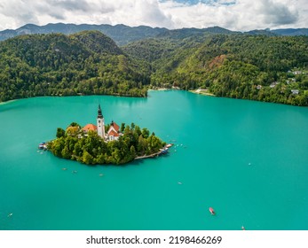 Aerial View Of Lake Bled Island With Emerald Green Water