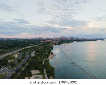 Aerial View Of Lake Ontario Waterfront With Toronto City Skyline On The Horizon. Shot From Above With Drone In Summer Time. Modern Architecture And Infrastructure Concept.