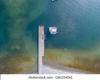 Aerial View Of Lakeside Beach With No People. Beautiful Sea Floor Under Water. Ground Visible From Above.