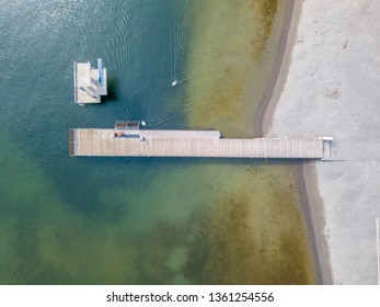 Aerial View Of Lakeside Beach With No People. Beautiful Sea Floor Under Water. Ground Visible From Above.