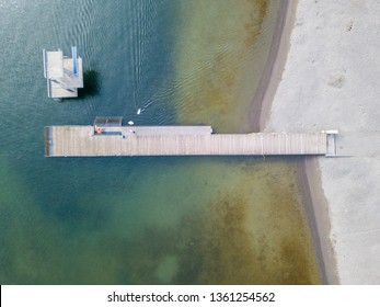 Aerial View Of Lakeside Beach With No People. Beautiful Sea Floor Under Water. Ground Visible From Above.