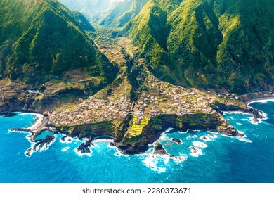 Aerial view - land meets ocean in Seixal, Madeira, Portugal - Powered by Shutterstock