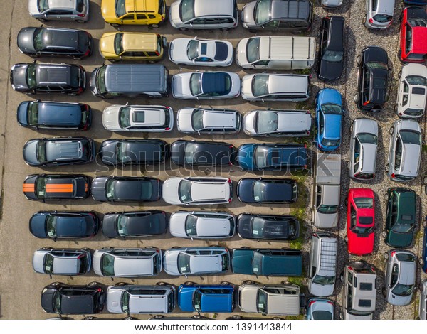 Aerial view of large car parking of car dealer.\
Secondhand cars.