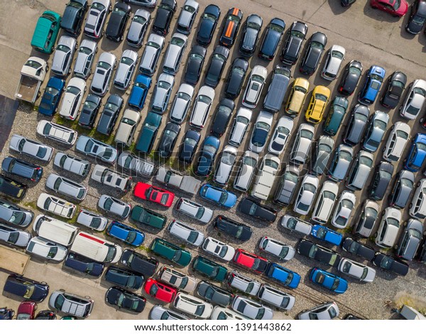 Aerial view of large car parking of car dealer.\
Secondhand cars.