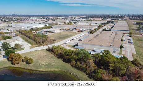 Aerial View Large Commercial Warehouse And Downtown Dallas In Background Carrollton Texas, USA. Lakeside  Mixed Use Zoning With Facility Service Building, Purchasing, Transportation Companies