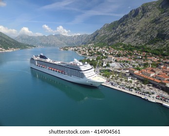 Aerial View Of Large Cruise Ship Near The Pier 