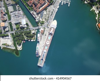 Aerial View Of Large Cruise Ship Near The Pier 