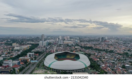 Aerial View of The largest stadium of Bekasi from drone and noise cloud. Bekasi, Indonesia, March 2, 2022