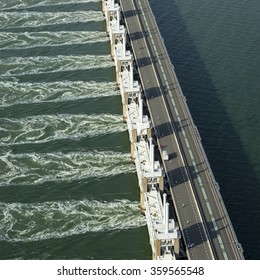 Aerial view in the late evening of the Oosterscheldekering, a storm surge barrier which is part of the delta works to protect Holland from high sea level